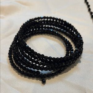 Black small bead spiral bracelet and matching necklace.